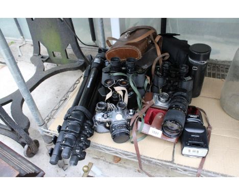 AN ASSORTMENT OF PHOTOGRAPHY ITEMS TO INCLUDE FOUR PAIRS OF VINTAGE BINOCULARS, A PENTAX CAMERA, A MANFROTTO TRIPOD STAND AND