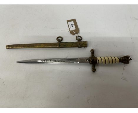 A NAZI GERMANY WWII KRIEGSMARINE DAGGER AND SCABBARD, 25.5CM BLADE WITH ACID ETCHED DECORATION MARKED PAUL WEYERSBERG SOLINGE