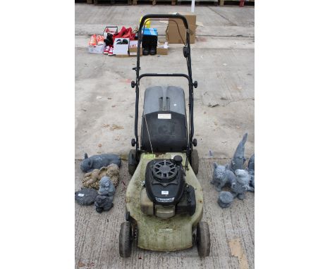 A CHAMPION PETROL LAWN MOWER WITH A HONDA ENGINE 
