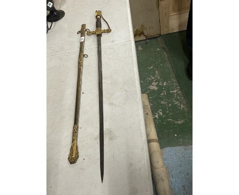 A FRATERNITY KNIGHTS OF THE GOLDEN EAGLE SWORD AND SCABBARD, 77CM BLADE, GILT CROSS GUARD AND EAGLE POMMEL, LENGTH 101CM 
