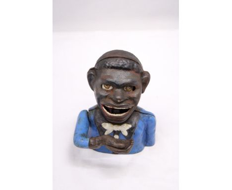 A VINTAGE CAST IRON AFRICAN AMERICAN MECHANICAL BANK 