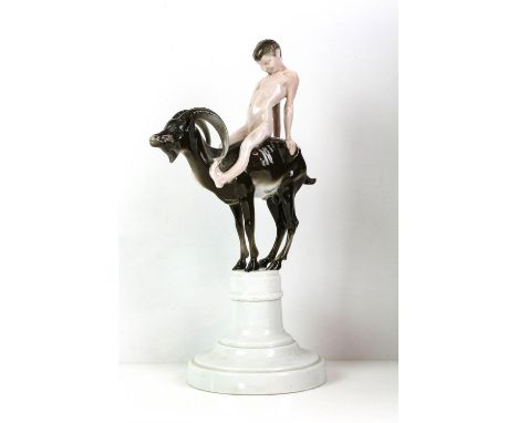 FERDINAND LIEBERMANN (GERMAN, 1883-1941) FOR ROSENTHAL, a porcelain model of a boy and goat, on a pedestal, faint painted sig