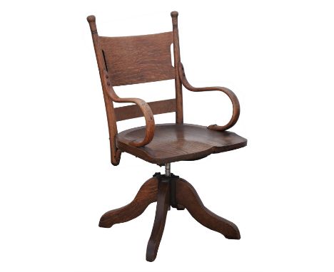 ARTS AND CRAFTS, an oak and bent wood swivel chair, on four down swept feet, 98cm highCondition Report:  Stable splits to the