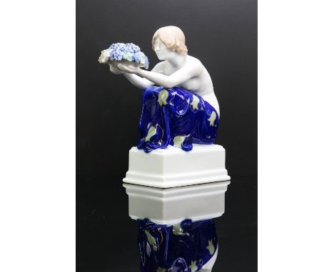 RUDOLF MARCUSE (GERMAN, 1878-1930) FOR ROSENTHAL, a maiden offering grapes, designed 1917, impressed signature to base, 16cm 