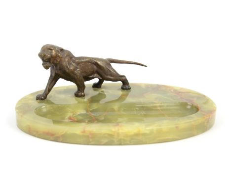 20TH CENTURY SCHOOL, a bronze and green onyx pen tray, by repute purchased from Liberty's, the tray 11cm tall, 25cm wide 