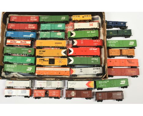 AHM, Roco, Lima HO. Group of unboxed freight cars. To include AHM "Santa Fe" box car, Roco "Polaroid Land Film" box car, Lima