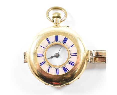 An antique Swiss 18ct yellow gold cased pocket watch on 9ct gold strap. The half hunter pocket watch having a circular white 