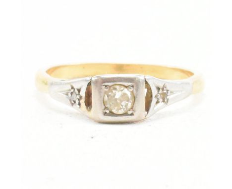 A vintage gold and diamond ring. The ring set with a round brilliant cut diamond to rose cut diamond shoulders and plain band