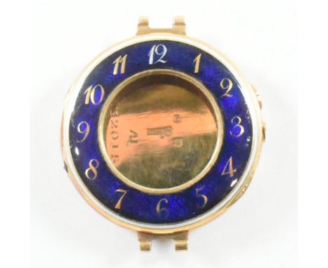 An antique hallmarked 15ct yellow gold and enamel wristwatch case. The watch case of circular form having a blue and white en