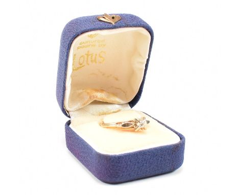 A vintage 14ct yellow gold and diamond solitaire ring. The single stone engagement style ring having a round cut exaggerated 