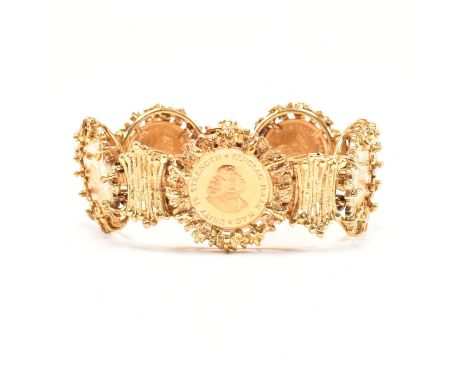 A vintage 9ct yellow gold one Rand coin set bracelet. The bracelet comprised of five 1973 South African one Rand coins in bru