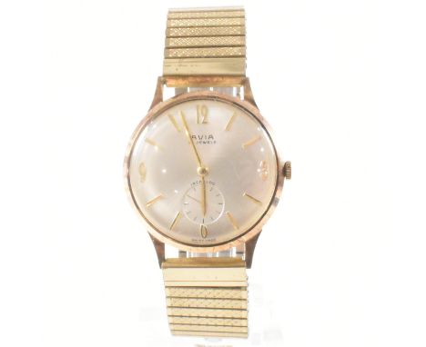 A hallmarked vintage 9ct gold cased Avia wristwatch. The watch having a circular silvered sunburst dial with mixed gold tone 