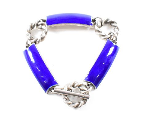 A vintage 1970's signed Gucci Italian silver and guilloche enamel chain bracelet. The bracelet comprised of twisted rope hoop