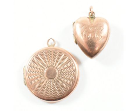 Two hallmarked antique and later locket pendants. The first in the form of a heart with etched monogrammed initials to the bo