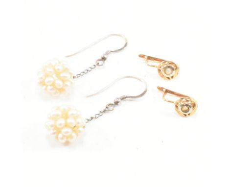 A pair of 18ct gold and white stone earrings. Weight 1.1g. Together with a pair of 925 silver and pearl cluster earrings. Wei