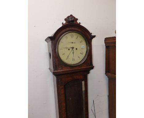 A MAHOGANY CASED EIGHT DAY LONG CASE CLOCK WITH ROUND DIAL.