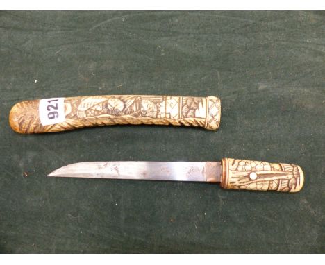 A SMALL JAPANESE KNIFE IN CARVED BONE SCABBARD