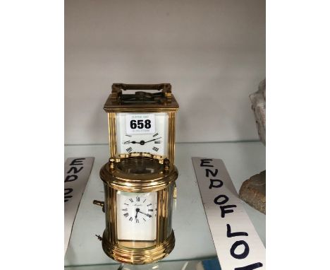A CARRIAGE TIME PIECE RETAILED BY MAPPIN AND WEBB TOGETHER WITH A MINIATURE CARRIAGE CLOCK OF OVAL SECTION