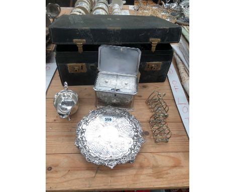 A GREEN LEATHER DRESSING CASE, AN ELECTROPLATE TEA CADDY, A WAITER, A SAUCE BOAT AND TWO TOAST RACKS