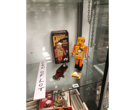 A FANTASTIC &amp; CO. CLOCKWORK TIN PLATE ROBOT AND A MINIC CLOCKWORK TOW TRUCK 