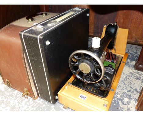 A VINTAGE SINGER SEWING MACHINE ETC. 