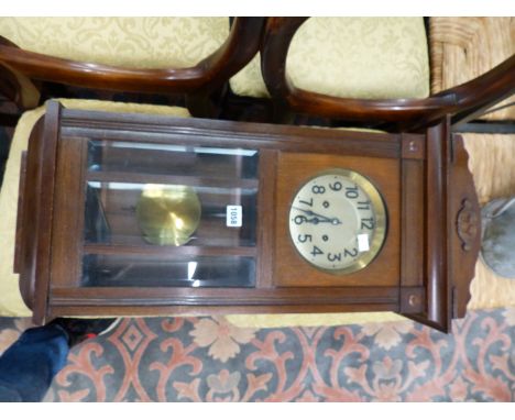 A ANTIQUE OAK CASED WALL CLOCK