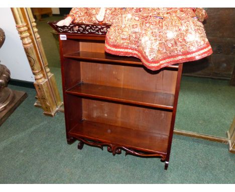 A MAHOGANY WALL SHELF.