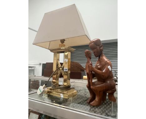 A BRASS TABLE LAMP TOGETHER WITH AN AFRICAN CARVED WOOD MOTHER AND CHILD