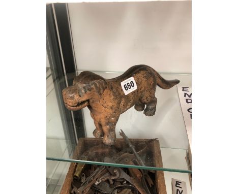 A PARCEL GILT IRON DOG FORM NUT CRACKER