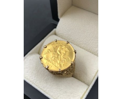 A 1911 22ct GOLD HALF SOVEREIGN IN A 9ct GOLD HALLMARKED RING MOUNT. FINGER SIZE O 1/2. GROSS WEIGHT 7.37grms. 