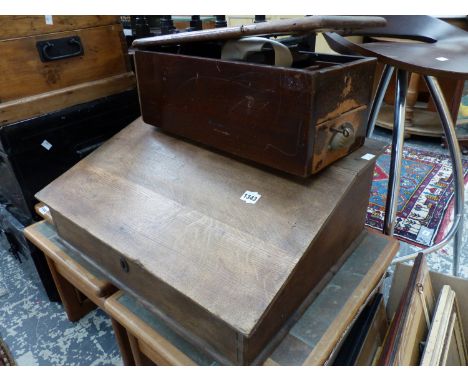 AN OAK CLERKS TABLE AND A VINTAGE TILL. 