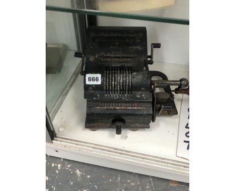 A VINTAGE HAND WOUND CALCULATING MACHINE