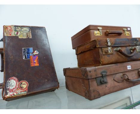 FOUR VINTAGE SUITCASES