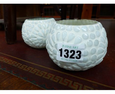 A QUANTITY OF GLASS TEA LIGHT HOLDERS.