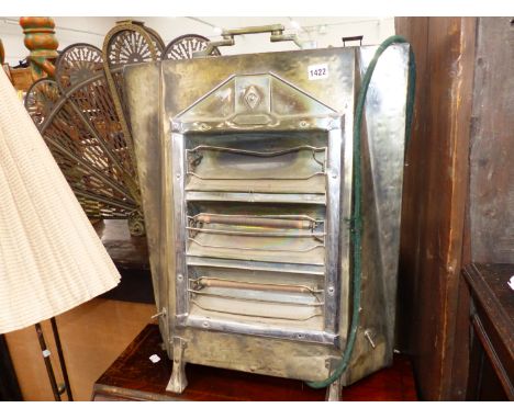 A RETRO ORNAMENTAL ELECTRIC HEATER AND A RETRO STANDARD LAMP. 