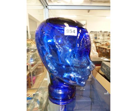 A BLUE GLASS VINTAGE HEAD DISPLAY. 