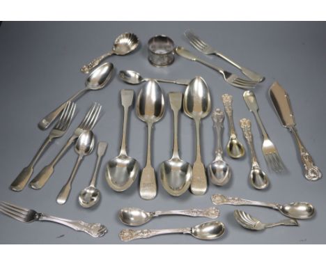 A group of assorted 19th century silver flatware including two caddy spoons (one Scottish) and a napkin ring, 26.5oz.CONDITIO