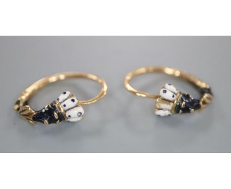 A pair of early 20th century Austro-Hungarian yellow metal and enamelled 'Blackamoor' loop earrings, 15mm, gross 2.1 grams.CO