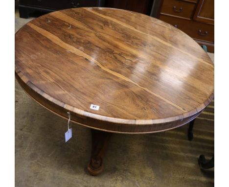 A Victorian rosewood circular topped breakfast table, diameter 113cm height 73cmCONDITION: Top looks to have been repolished 