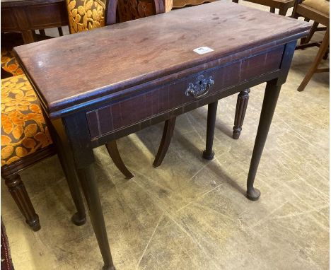 A mid 18th century mahogany folding top tea table, with frieze drawer, width 76cmCONDITION: Good rich dark colour but in need