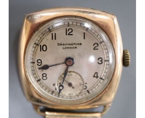 A gentleman's early 20th century 9ct gold manual wind wrist watch, retailed by Bravingtons, London, on later plated strap, gr