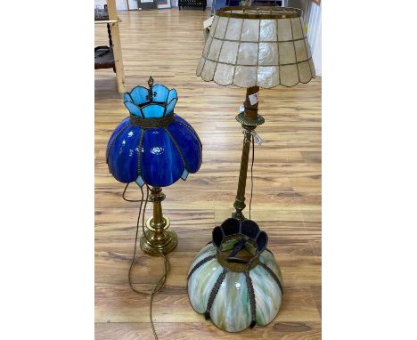 A brass column lamp and a brass standard lamp on three paw feet (with shades)CONDITION: The taller of the two has its upper r