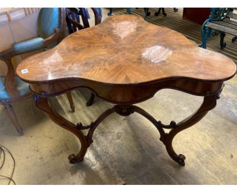 A Continental mahogany trefoil corner table, width 88cmCONDITION: Has bee repolished at some point, now top is slightly faded