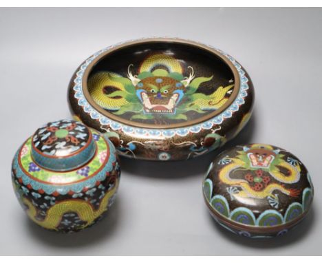 An early 20th century Chinese cloisonne enamel 'dragon' bowl, a similar box and cover and a ginger jar and cover, largest dia