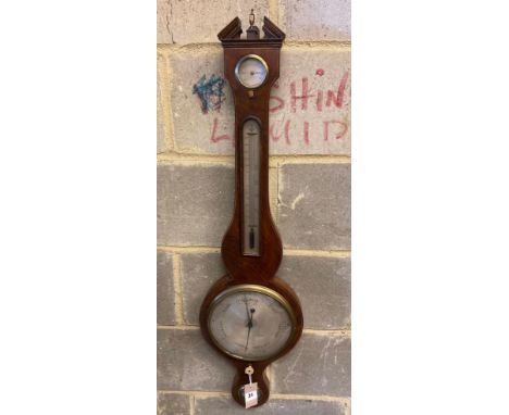 A Regency inlaid mahogany wheel barometer, by P. Bouffler of LondonCONDITION: Some light wear to the case, hand to the hygrom