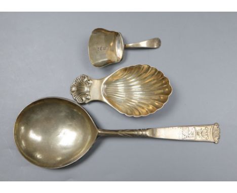 An early 18th century Dutch white metal spoon, the bowl underside monogrammed TIS-KLD and two silver caddy spoons.CONDITION: 