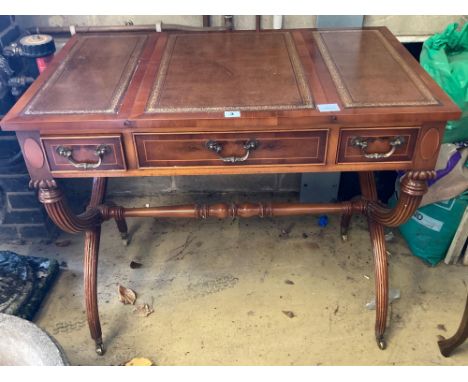 A modern yew wood and mahogany writing table, with sliding backgammon and chessboard top, width 92cmCONDITION: Good clean con