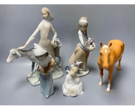 Three Lladro figures, largest 29cm, A Nao seated cherub and a Beswick horseCONDITION: Beswick horse - front left leg glue rep