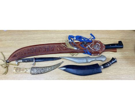 Five various weapons including a Kukri, a carved bone handled dagger with brass 'sun, moon and stars' sheath and an El Salvad