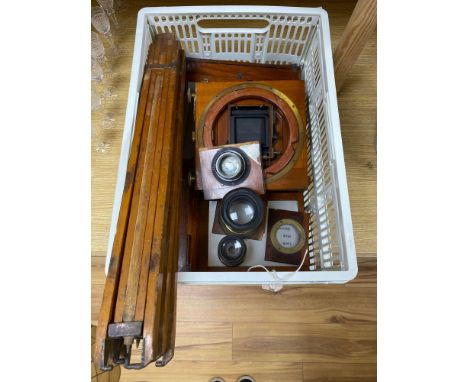 A Thornton Pickard 'Ruby' folding mahogany and brass camera and a similar Spiers and Ponds cameraCONDITION: Generally a littl
